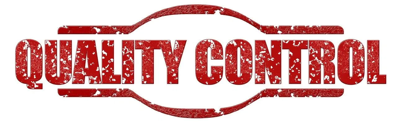 Grungy red rubber stamp style emblem with the words 'QUALITY CONTROL' in bold capital letters.