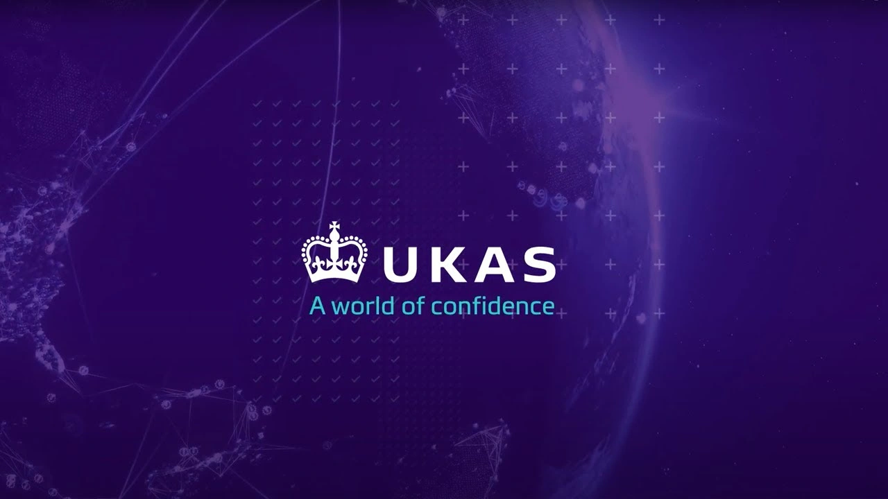UKAS logo with crown and tagline 'A world of confidence' on a purple background with a globe and network graphics.